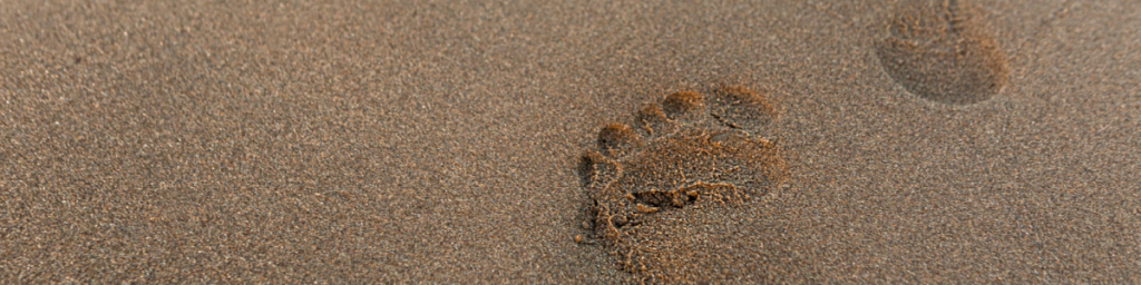 Footprints on the sand beach